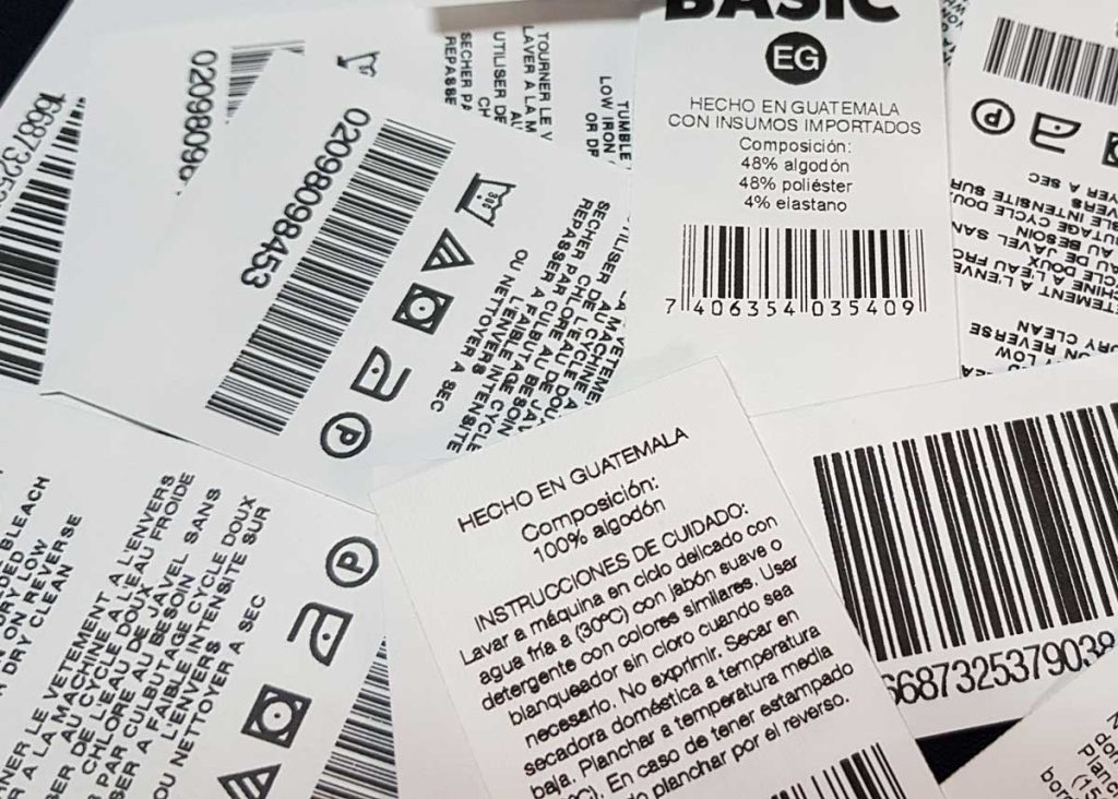 Etiquetas textiles impresas con códigos de barra, instrucciones de cuidado, etc.